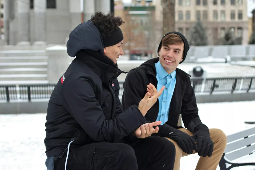 Young men chatting about intersectionality